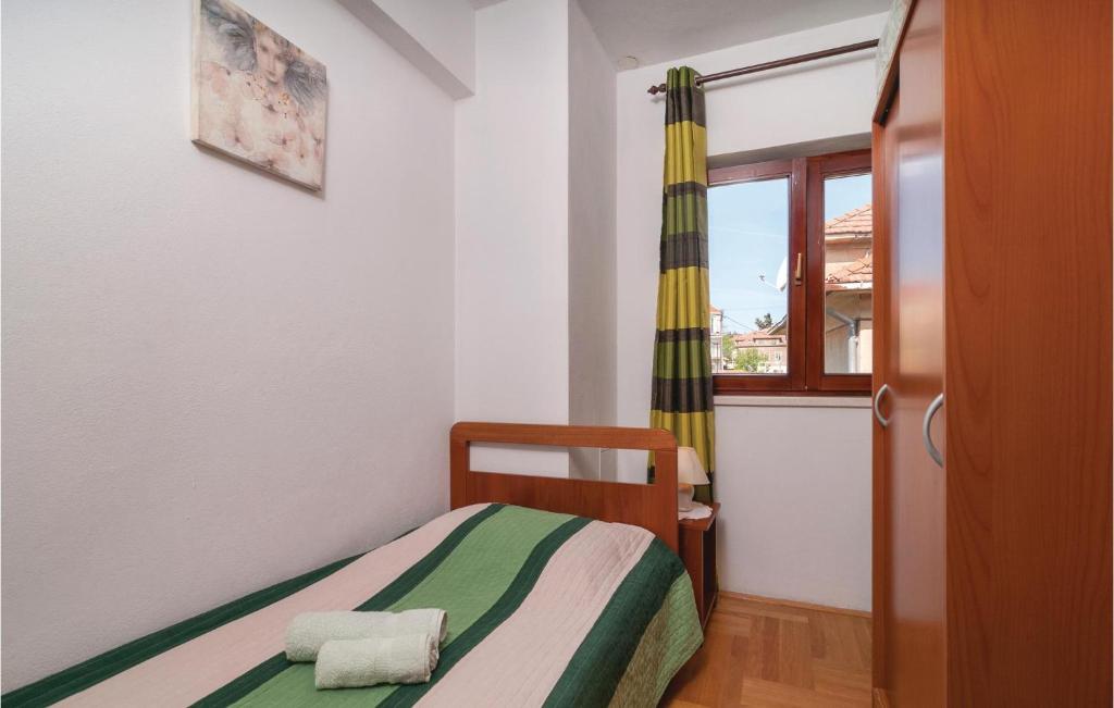 Posteľ alebo postele v izbe v ubytovaní Two-Bedroom Apartment In Split