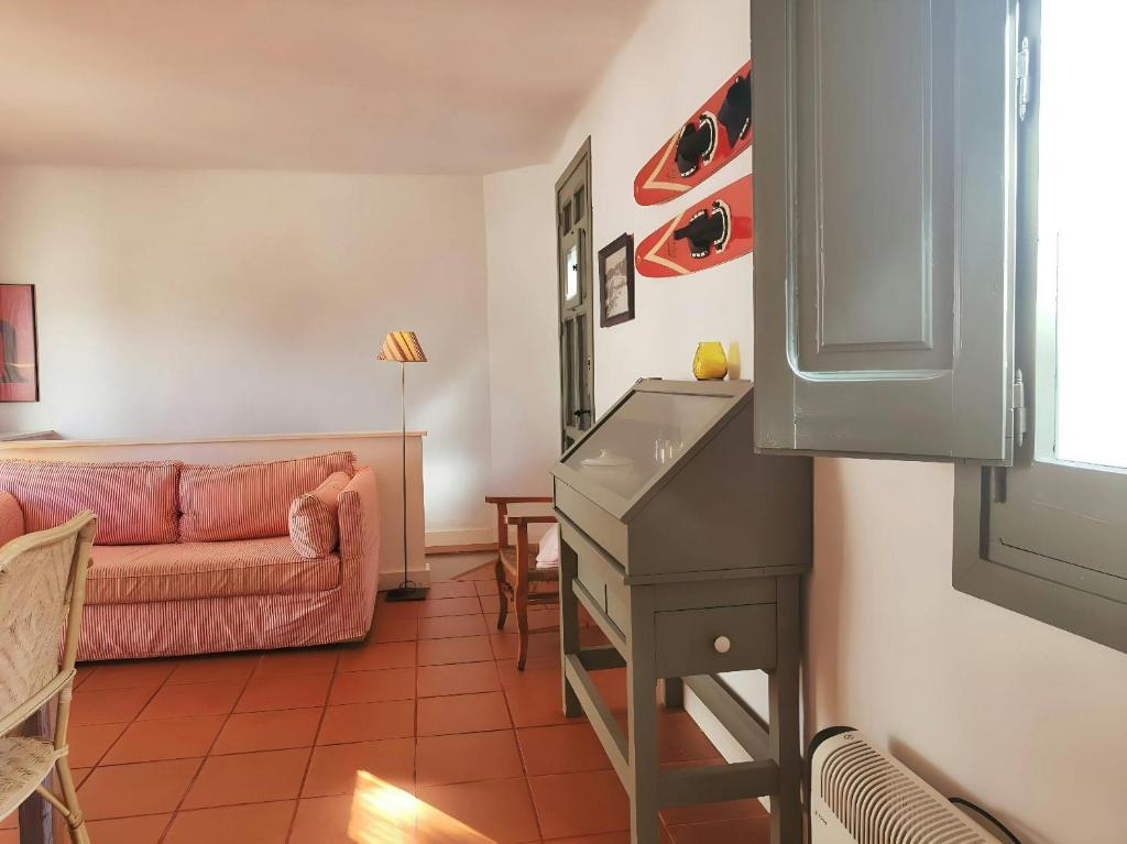 Posedenie v ubytovaní T2 · Sunny duplex with garden 50m from beach