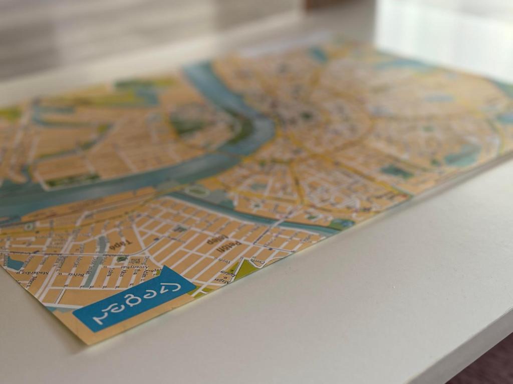 a map of a city on a table at SunSuite Szeged in Szeged