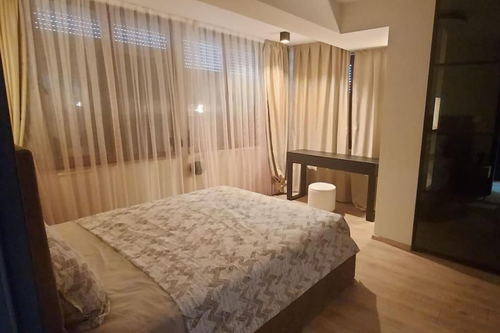 Postel nebo postele na pokoji v ubytování Екип-МГ