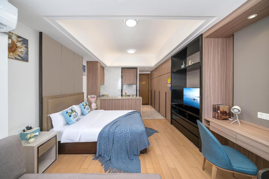 Postel nebo postele na pokoji v ubytování Hantao AI Select International Apartment