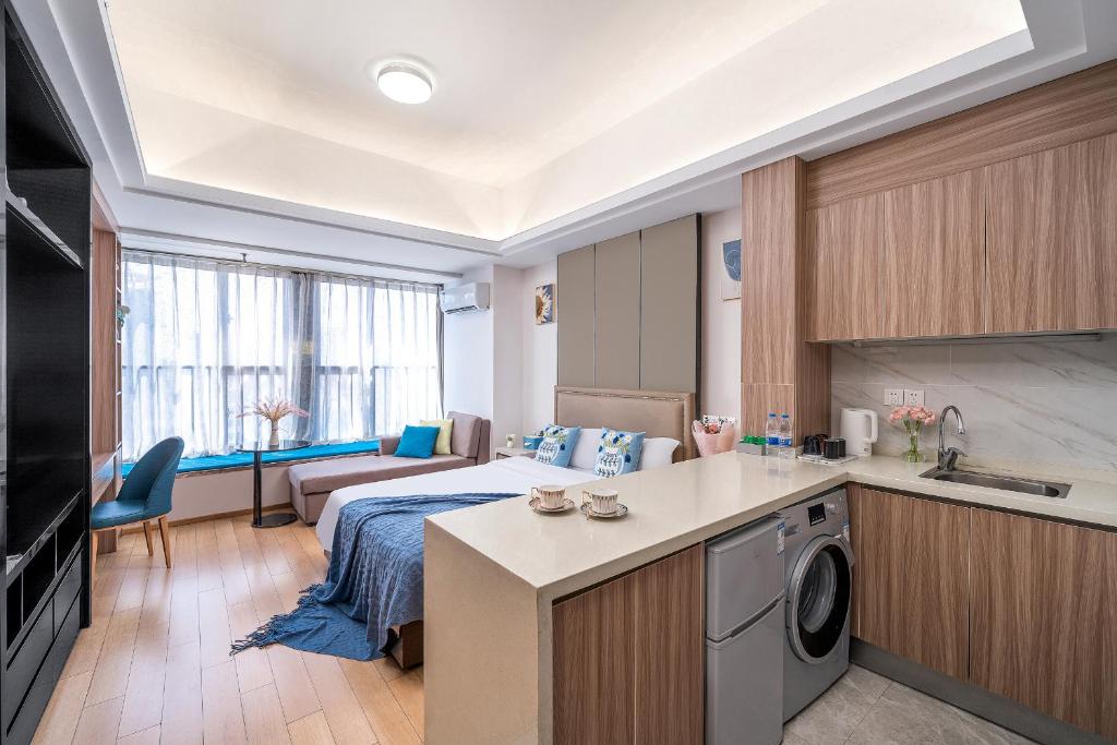 Kuchyň nebo kuchyňský kout v ubytování Hantao AI Select International Apartment
