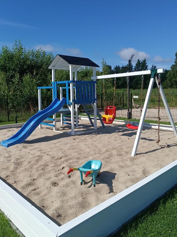 Herní místnost nebo prostor pro děti v ubytování Słoneczne Tarasy Słajszewo