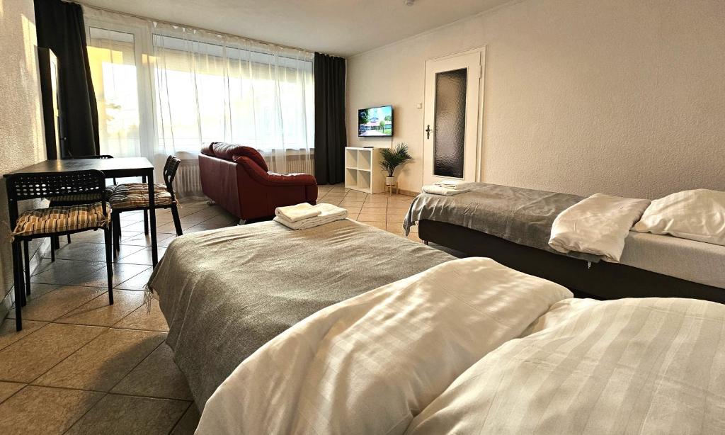 Giường trong phòng chung tại City Apartments