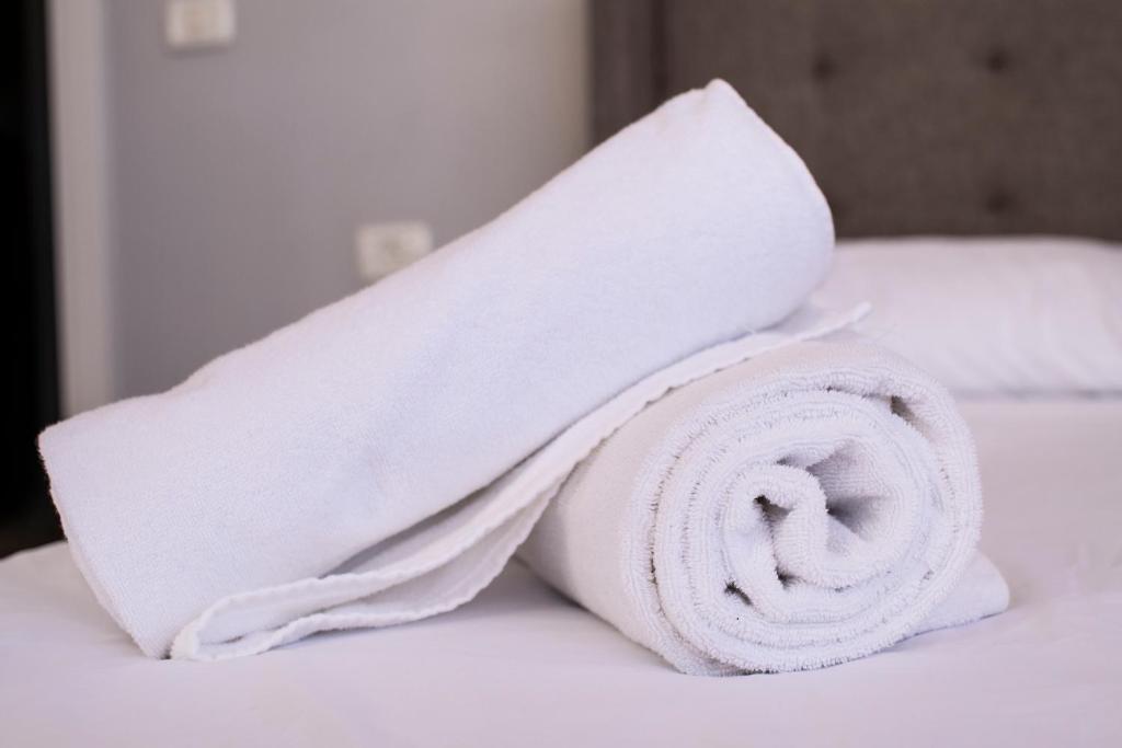 Postel nebo postele na pokoji v ubytování Hotel Apartments 270