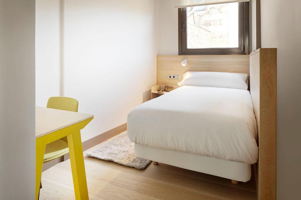 Postel nebo postele na pokoji v ubytování Hotel Imaz