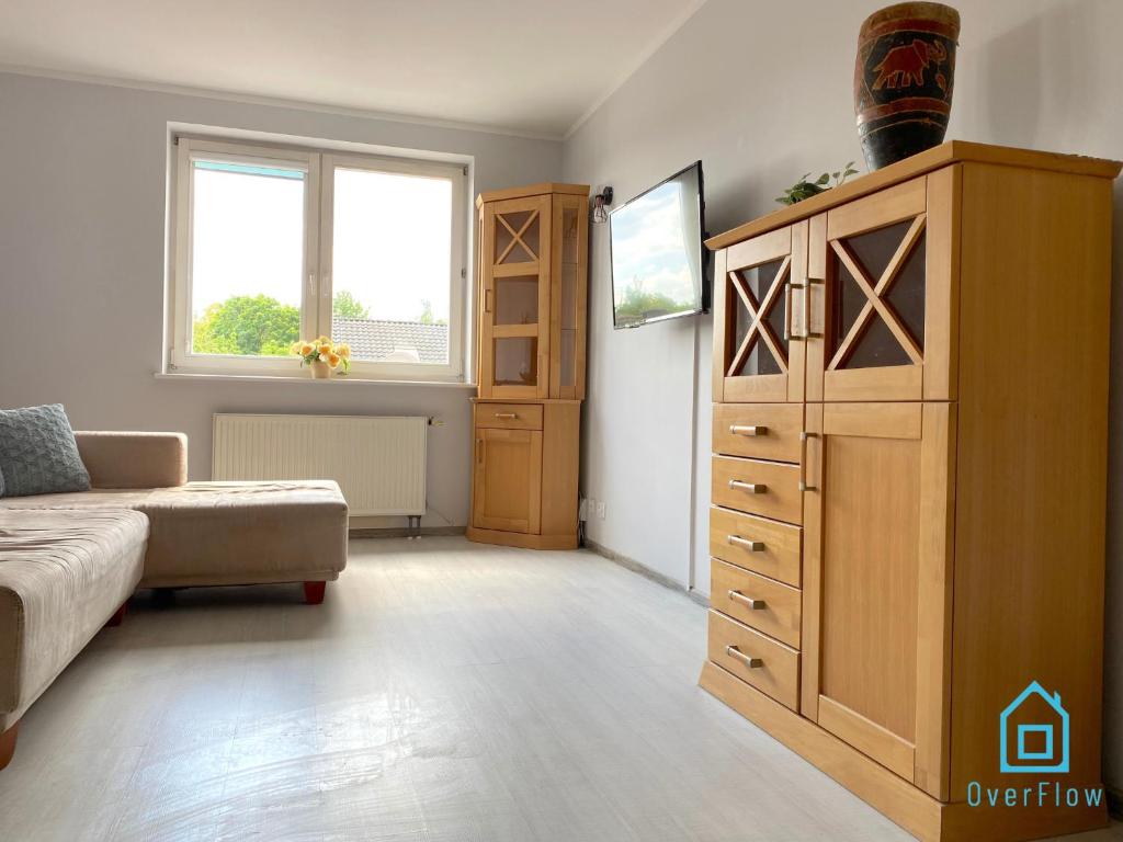 Televízia a/alebo spoločenská miestnosť v ubytovaní Teddy Bear Room