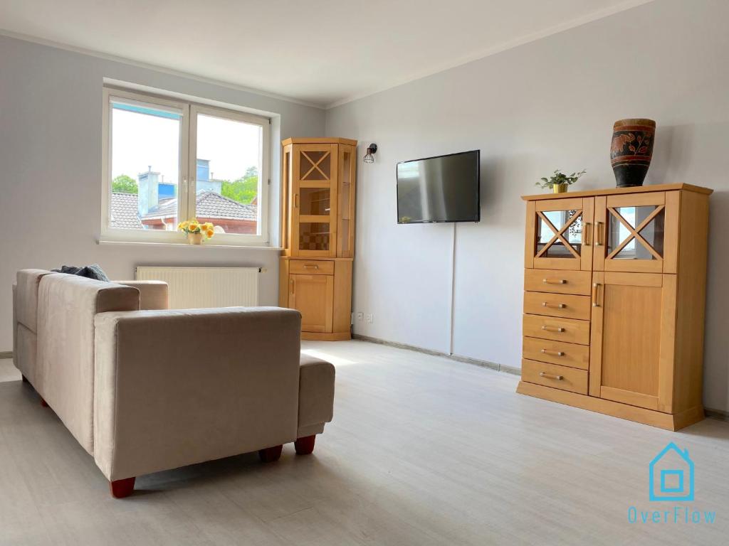 Televízia a/alebo spoločenská miestnosť v ubytovaní Circus Room
