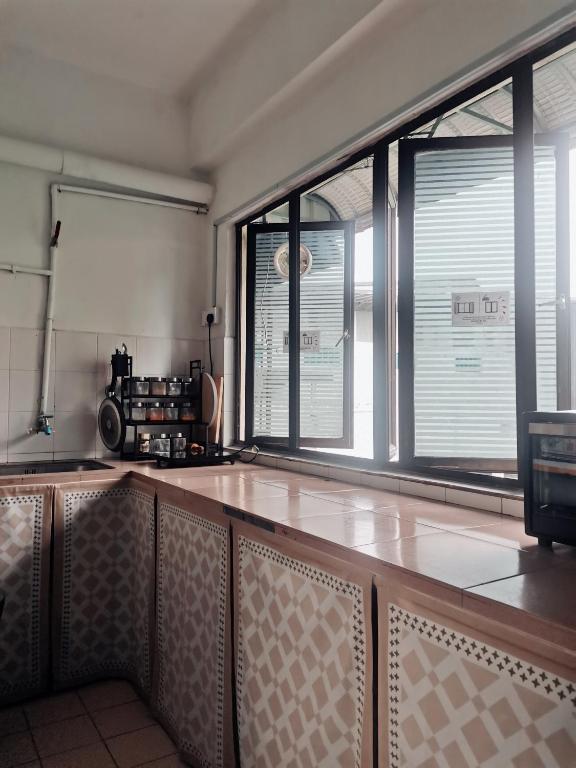 Fotografie z fotogalerie ubytování Sabai Sabai Guesthouse in Bayan Lepas v destinaci Bayan Lepas