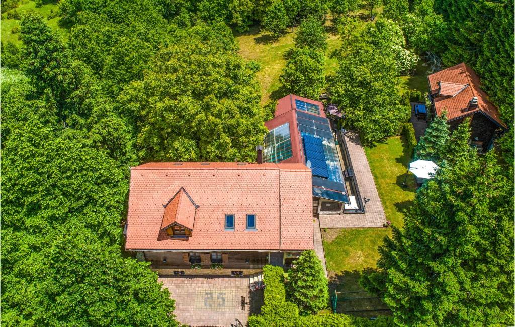 an overhead view of a house in the woods at Cozy Home In Cujica Krcevina in Čujića Krčevina