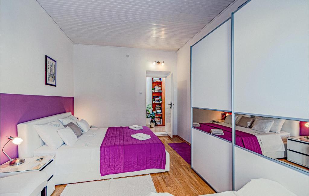 Postel nebo postele na pokoji v ubytování 1 Bedroom Nice Home In Korcula