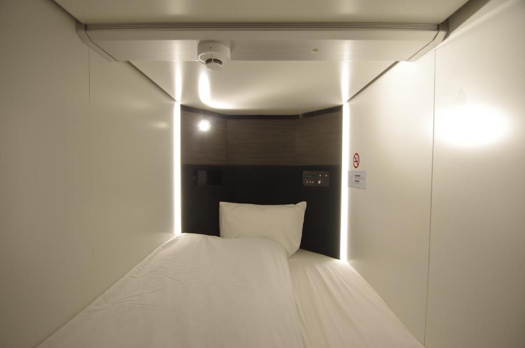 Postel nebo postele na pokoji v ubytování Hotel Imalle Haneda