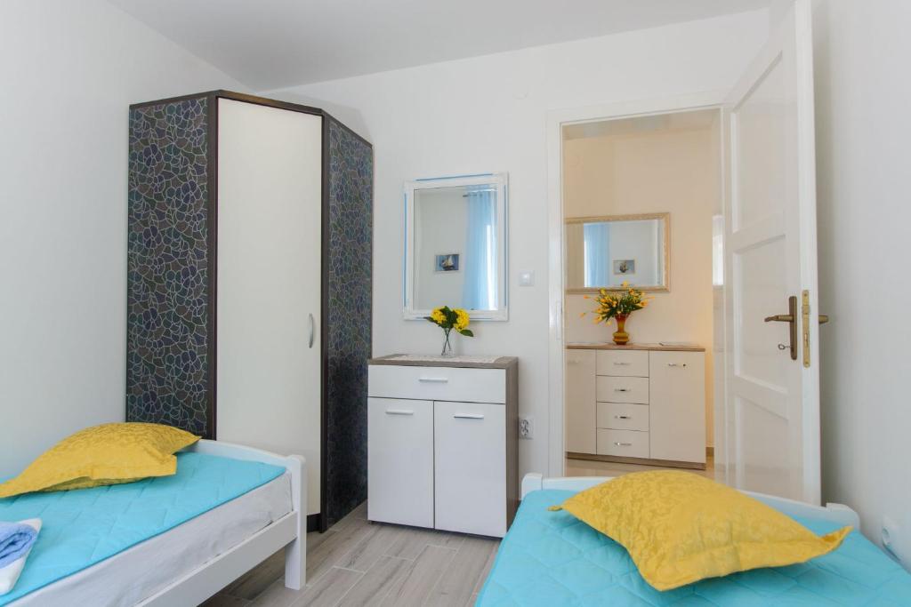 Postel nebo postele na pokoji v ubytování House Mirjana
