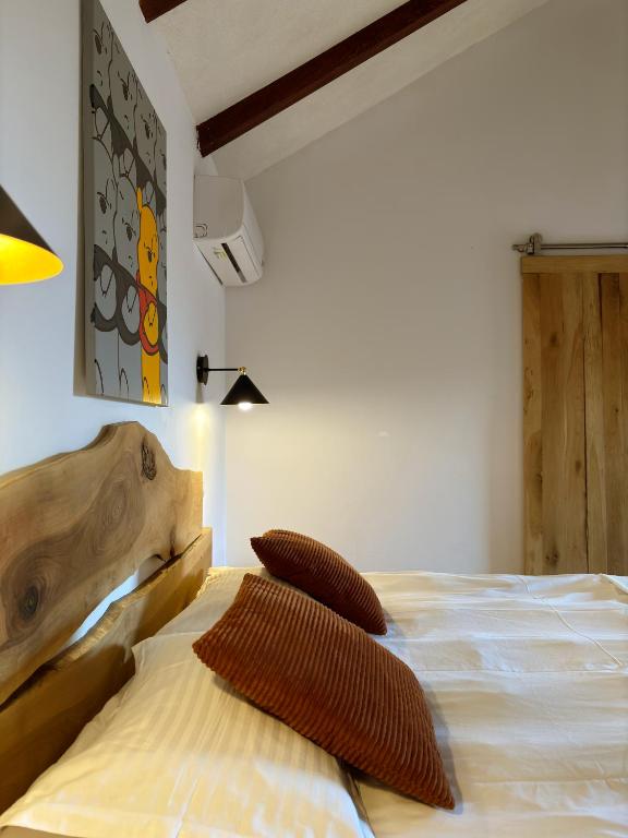 Postel nebo postele na pokoji v ubytování Elma Guesthouse