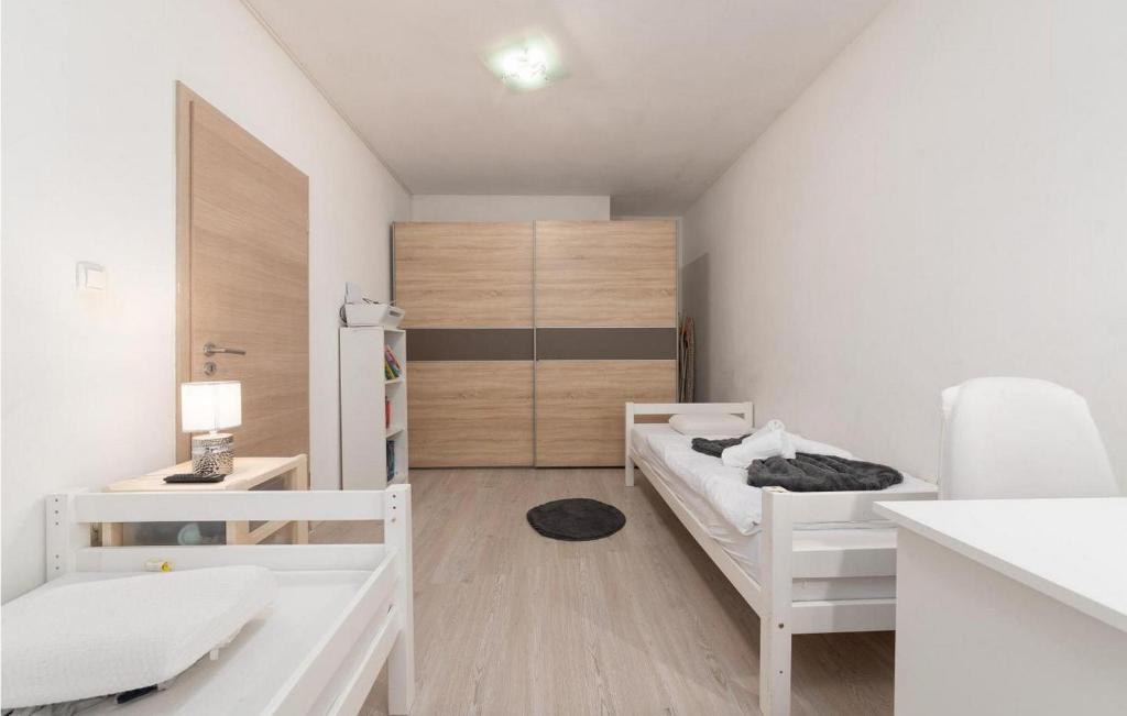 Postel nebo postele na pokoji v ubytování Casa Sara And Sascha