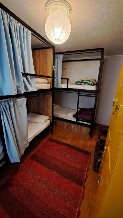 Posteľ alebo postele v izbe v ubytovaní Hostel El Cascabel