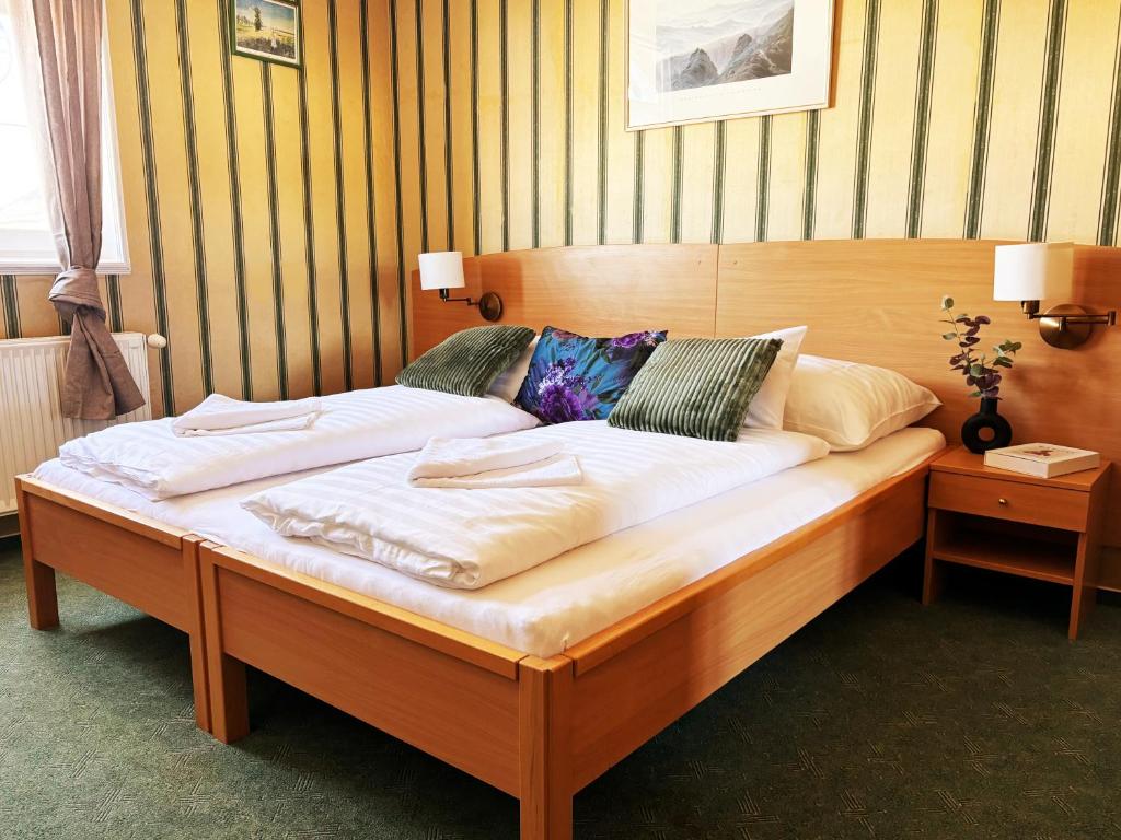 Postel nebo postele na pokoji v ubytování Levendula Resort és Rendezvényközpont