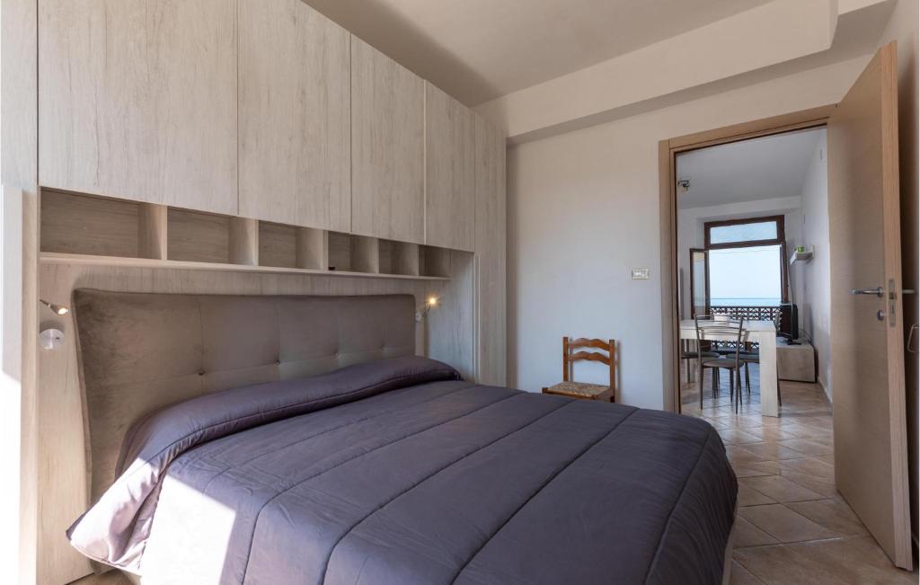 Postel nebo postele na pokoji v ubytování Stunning Apartment In Giannella