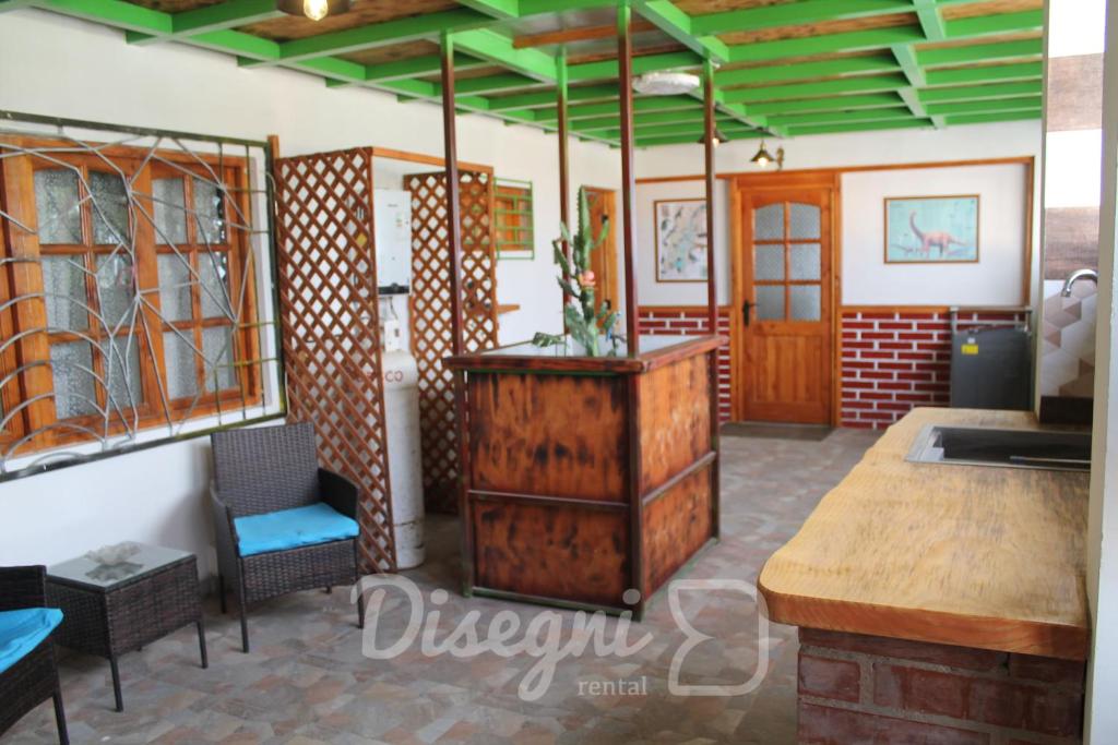 Fotografie z fotogalerie ubytování Hostal Cristina, Central Caldera, Habitación Privada Disegni 11-12 v destinaci Caldera