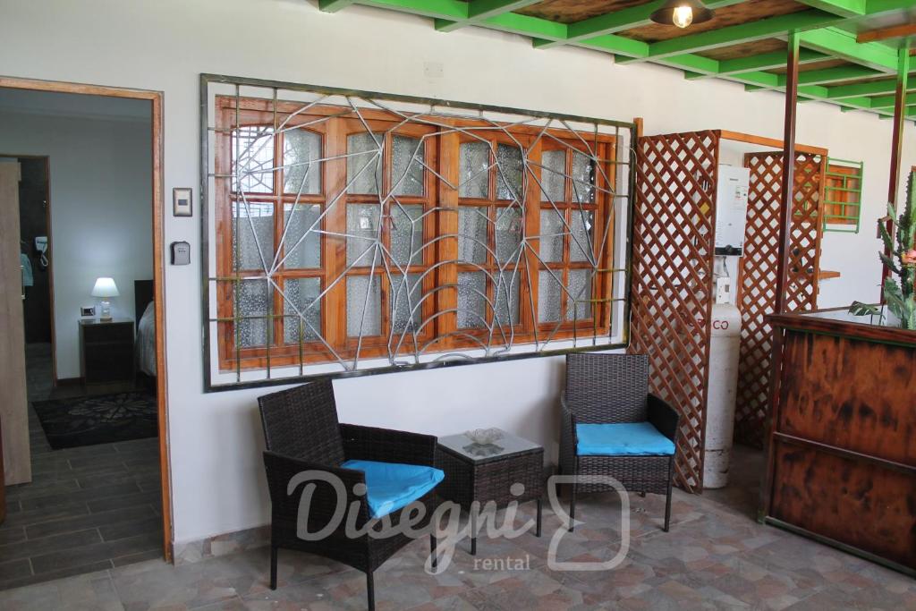 Posezení v ubytování Hostal Cristina, Central Caldera, Habitación Privada Disegni 11-12