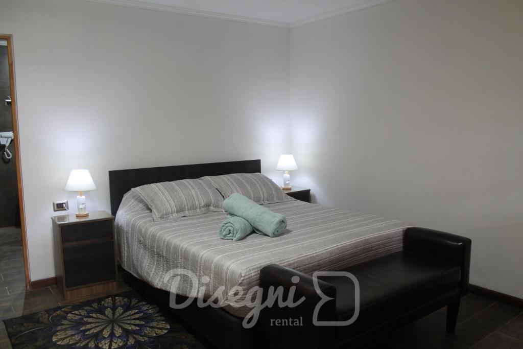 Postel nebo postele na pokoji v ubytování Hostal Cristina, Central Caldera, Habitación Privada Disegni 11-12