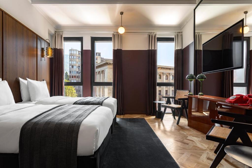 TV a/nebo společenská místnost v ubytování Hotel Afisha