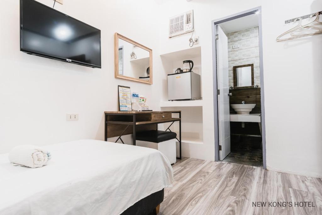 TV a/nebo společenská místnost v ubytování New Kong's Hotel
