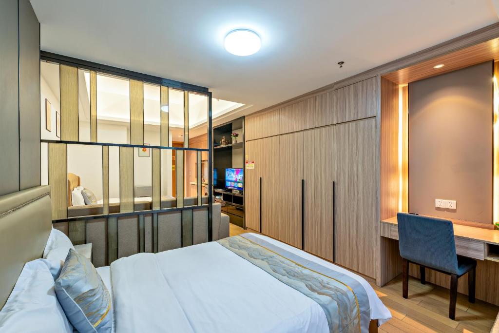 Postel nebo postele na pokoji v ubytování Hantao AI Select International Apartment