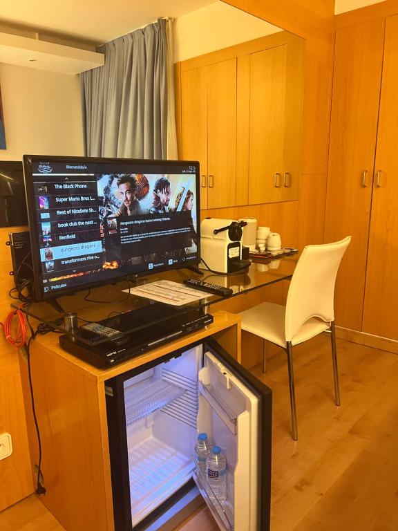 TV a/nebo společenská místnost v ubytování Platjador