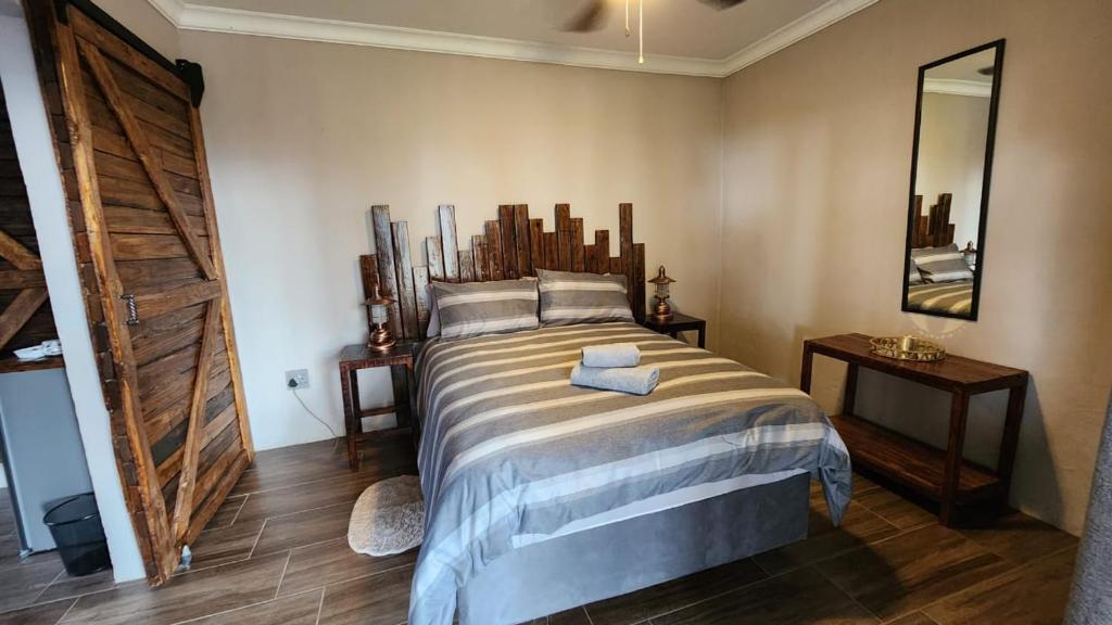 Postel nebo postele na pokoji v ubytování Twilight Suite