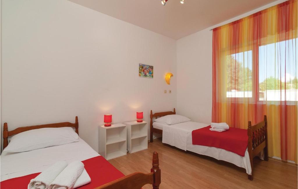 Posteľ alebo postele v izbe v ubytovaní Holiday Home Gata 15