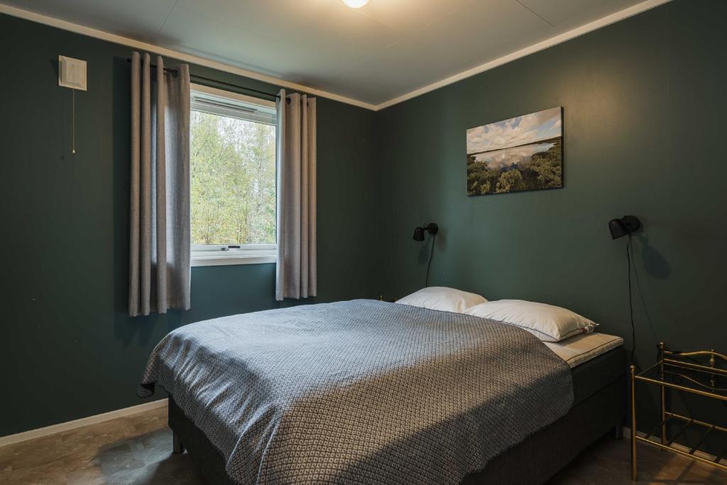 Postel nebo postele na pokoji v ubytování Fulufjellet