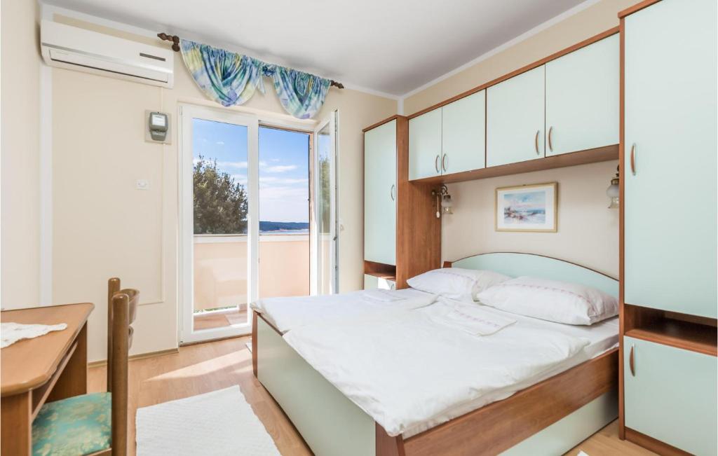 Postel nebo postele na pokoji v ubytování Pet Friendly Apartment