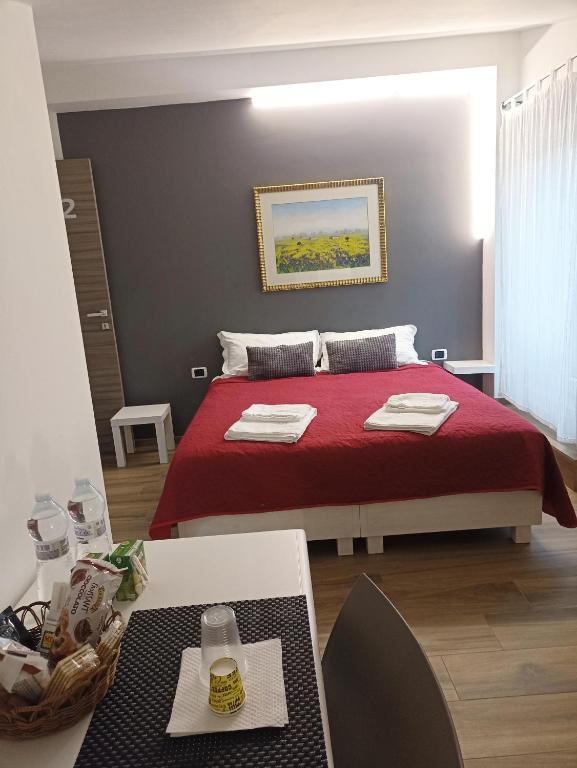 Postel nebo postele na pokoji v ubytování Attico al Gallitello