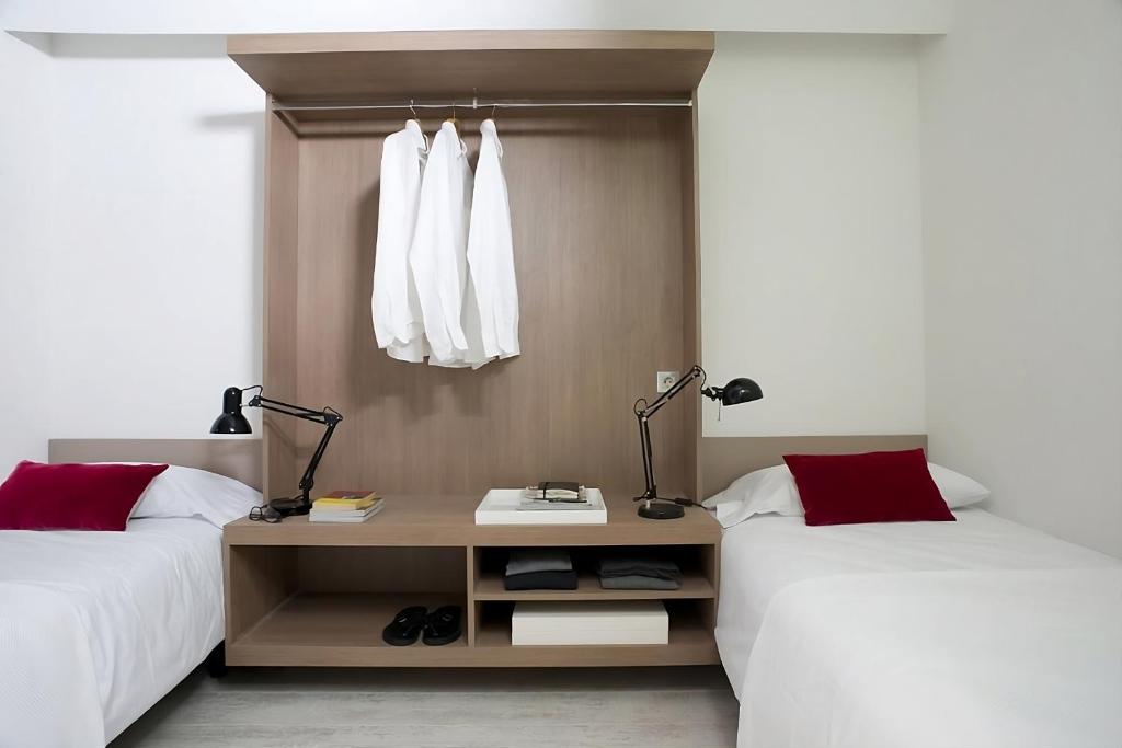 Postel nebo postele na pokoji v ubytování Eric Vökel Boutique Apartments - BCN Suites