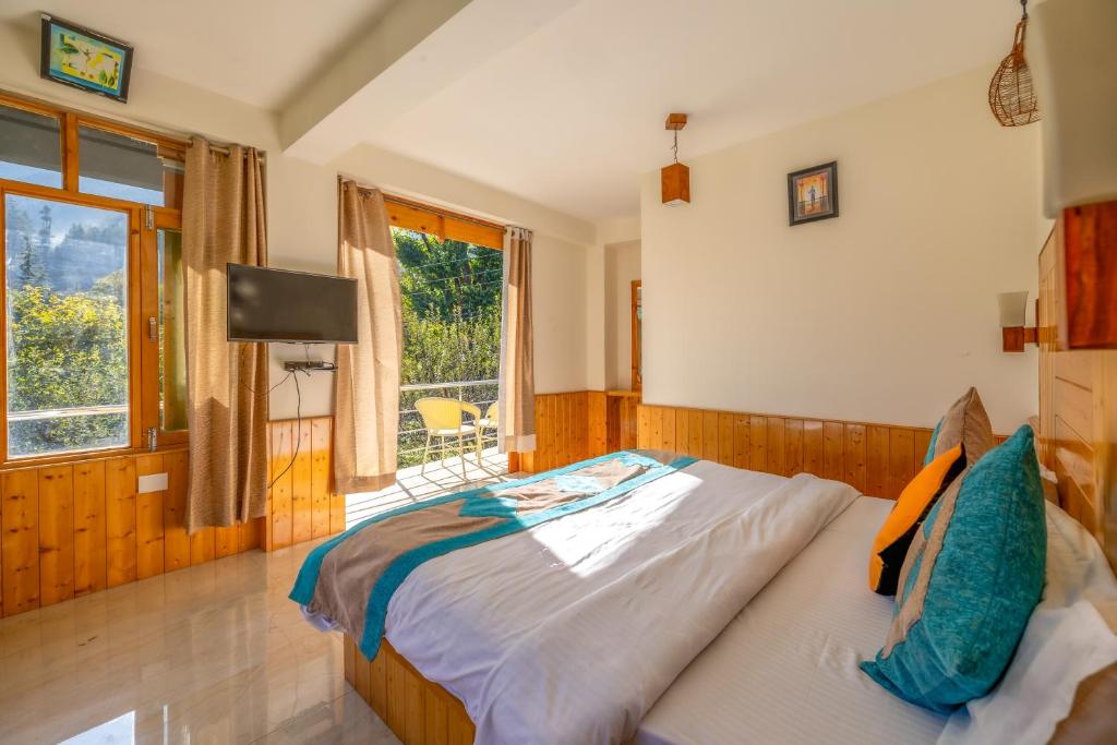 Postel nebo postele na pokoji v ubytování Hide-in Old Manali