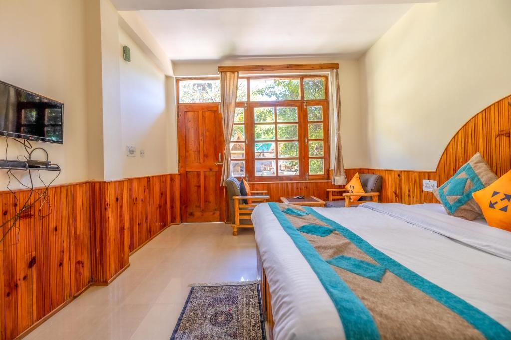 Postel nebo postele na pokoji v ubytování Hide-in Old Manali