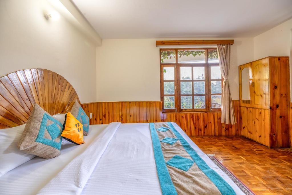 Postel nebo postele na pokoji v ubytování Hide-in Old Manali