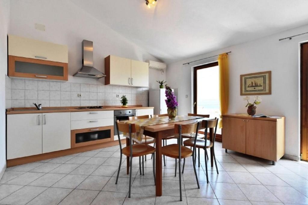 Kuchyň nebo kuchyňský kout v ubytování Apartments Nikola