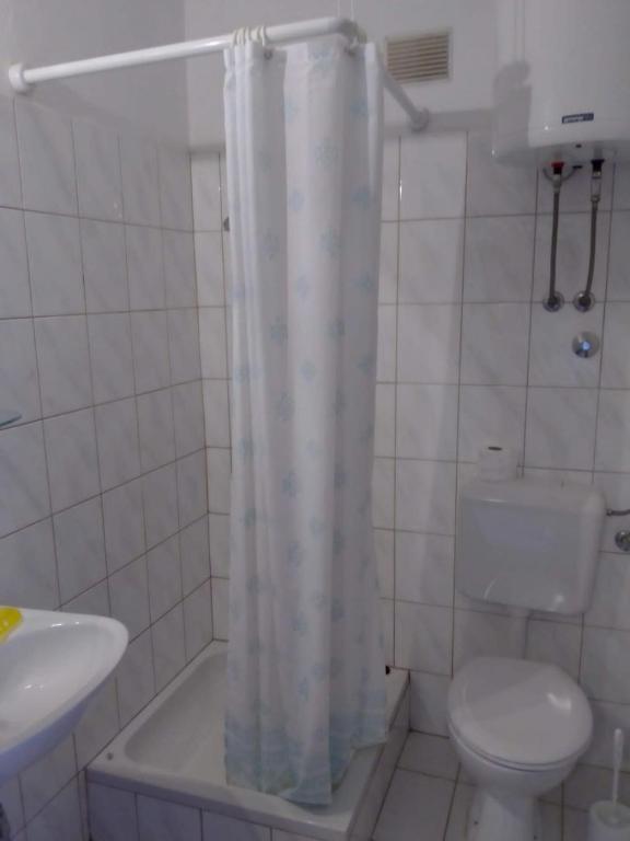 Koupelna v ubytování Apartments Nikola