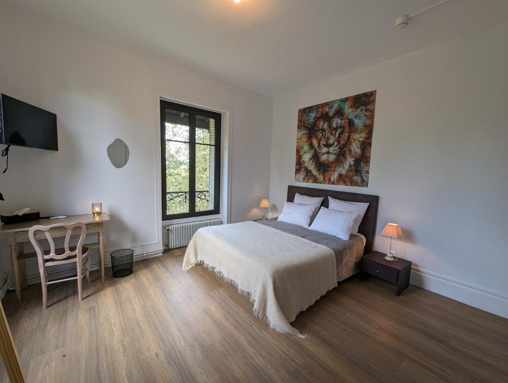 Postel nebo postele na pokoji v ubytování Manoir des Rêves Sauvages