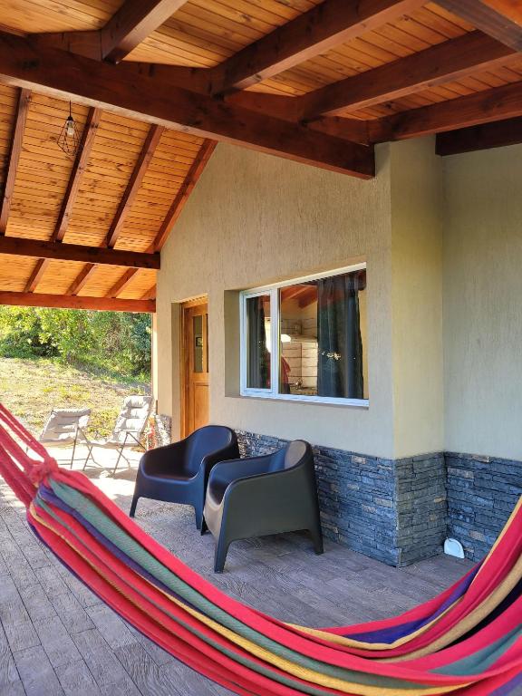 Posezení v ubytování Aparts chalet Alquimia