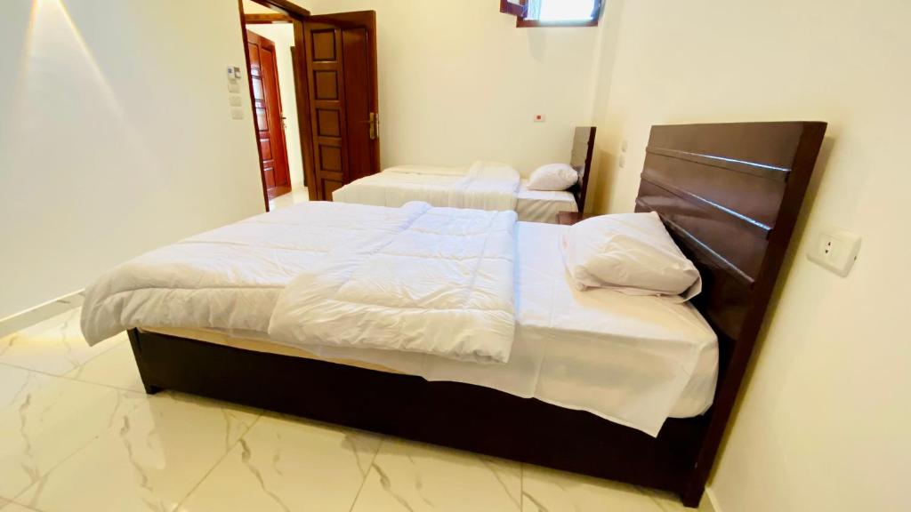 Postel nebo postele na pokoji v ubytování villa Sun Wing - Guest House