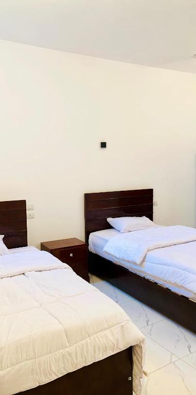 Postel nebo postele na pokoji v ubytování villa Sun Wing - Guest House