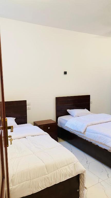 Postel nebo postele na pokoji v ubytování villa Sun Wing - Guest House