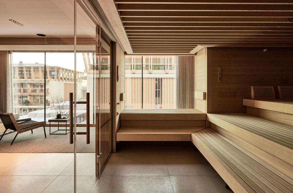 Letto o letti in una camera di Falkensteiner Hotel Kronplatz - The Leading Hotels of the World