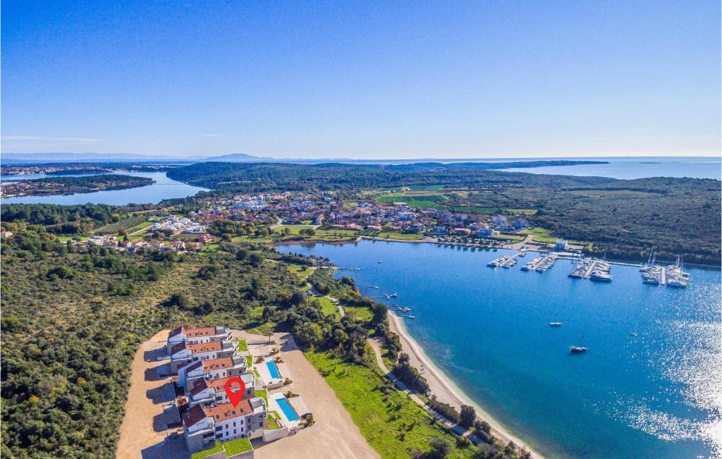 an aerial view of a harbor with boats in the water at Cozy Apartment In Banjole in Banjole