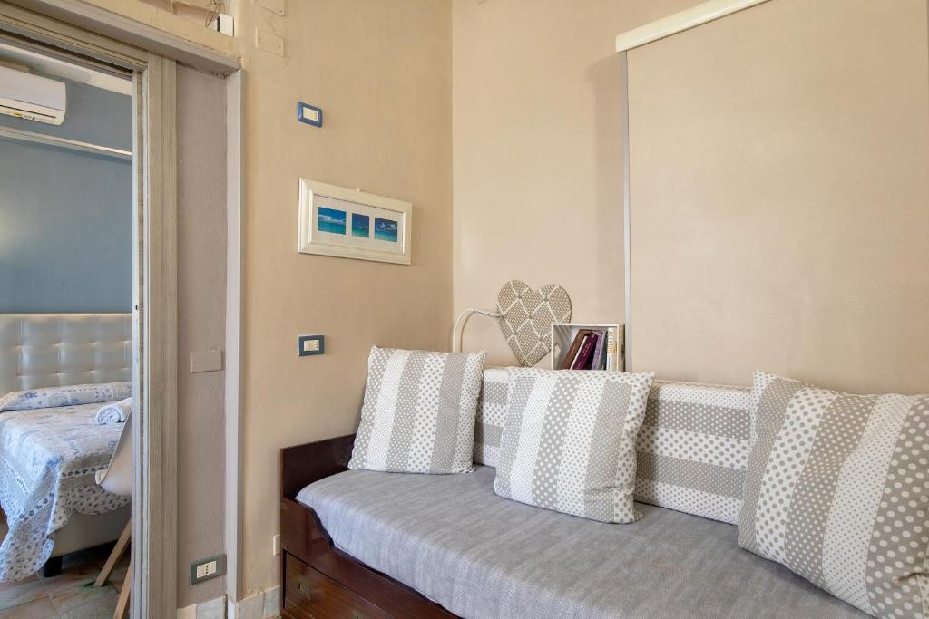 Posteľ alebo postele v izbe v ubytovaní Best Relax Home Marina Di Carrara