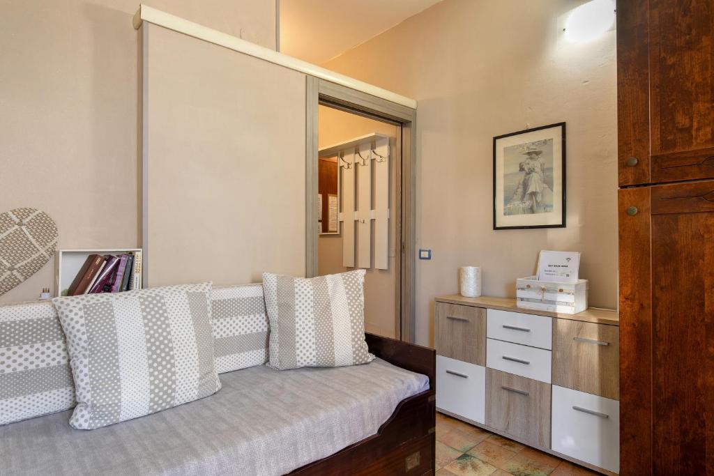 Posteľ alebo postele v izbe v ubytovaní Best Relax Home Marina Di Carrara