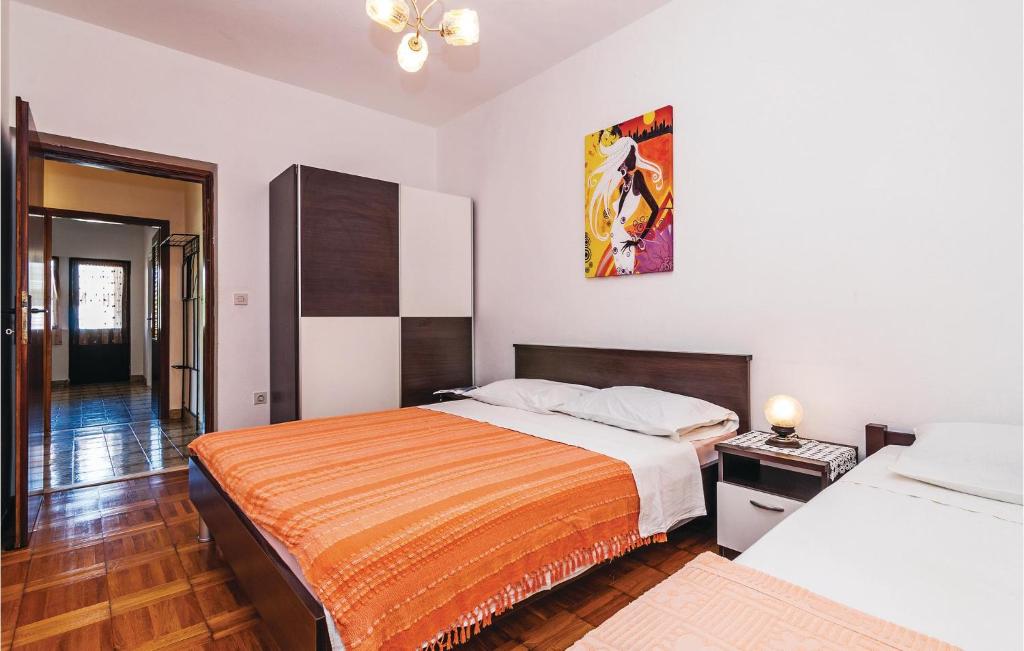 Postel nebo postele na pokoji v ubytování Holiday Home Sabunike V